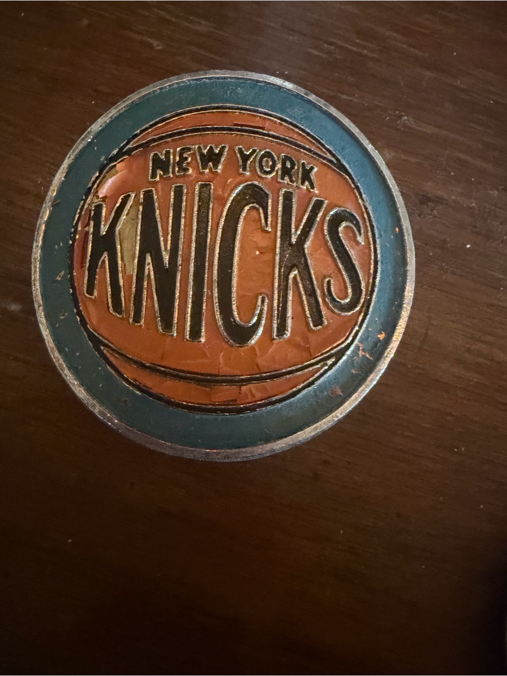 This vintage 1969–1976 NBA Properties New York Knicks belt buckle